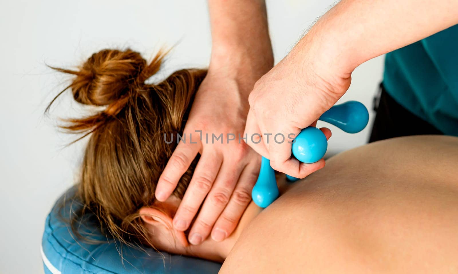 Girl during massage in spa salon by GekaSkr