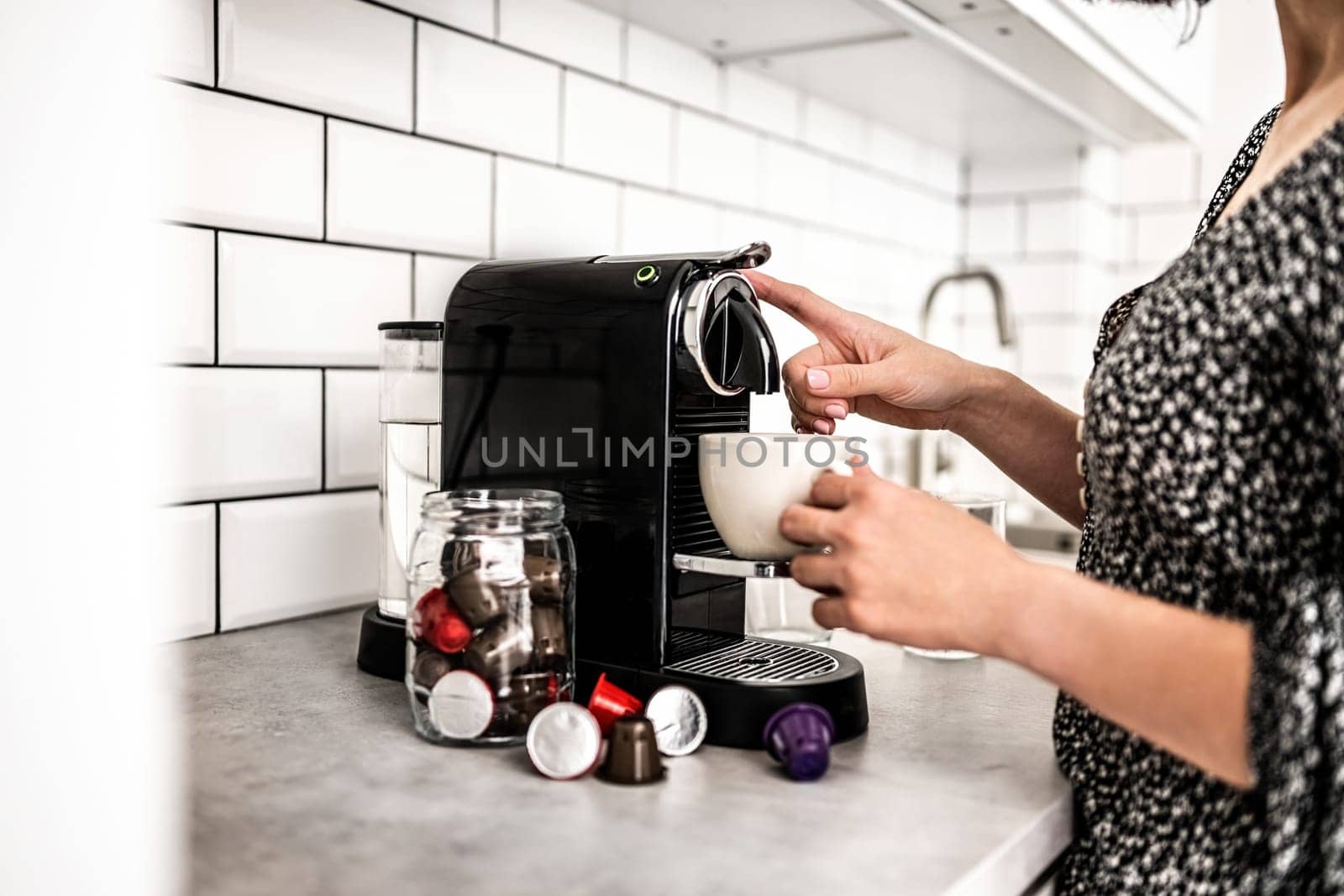 Capsule coffee machine at domestic kitchen by GekaSkr
