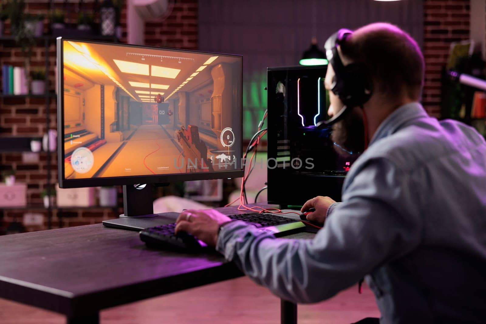 Gamer competing in esports competition by DCStudio