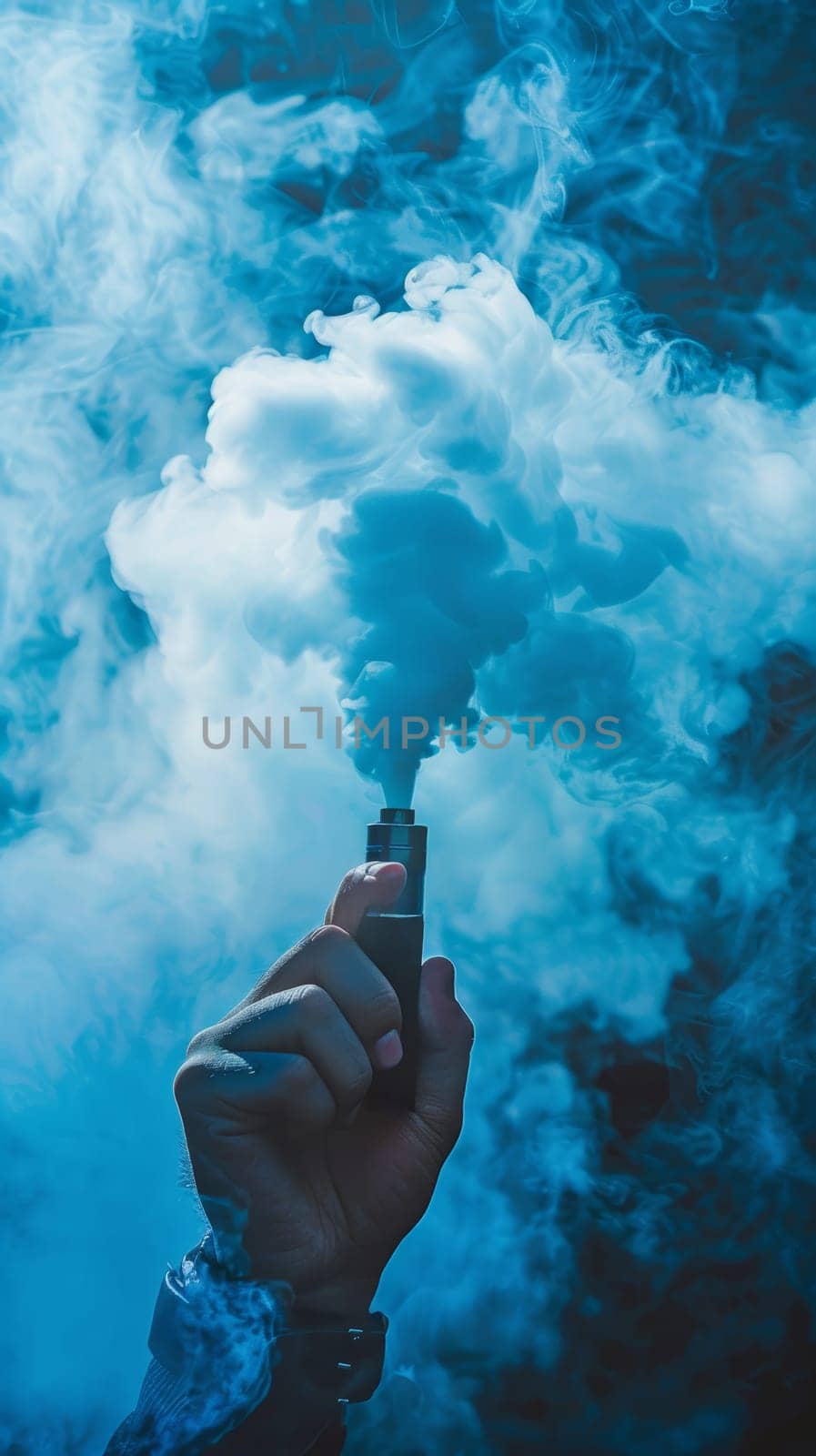 Hand holding a vaping device with smoke.