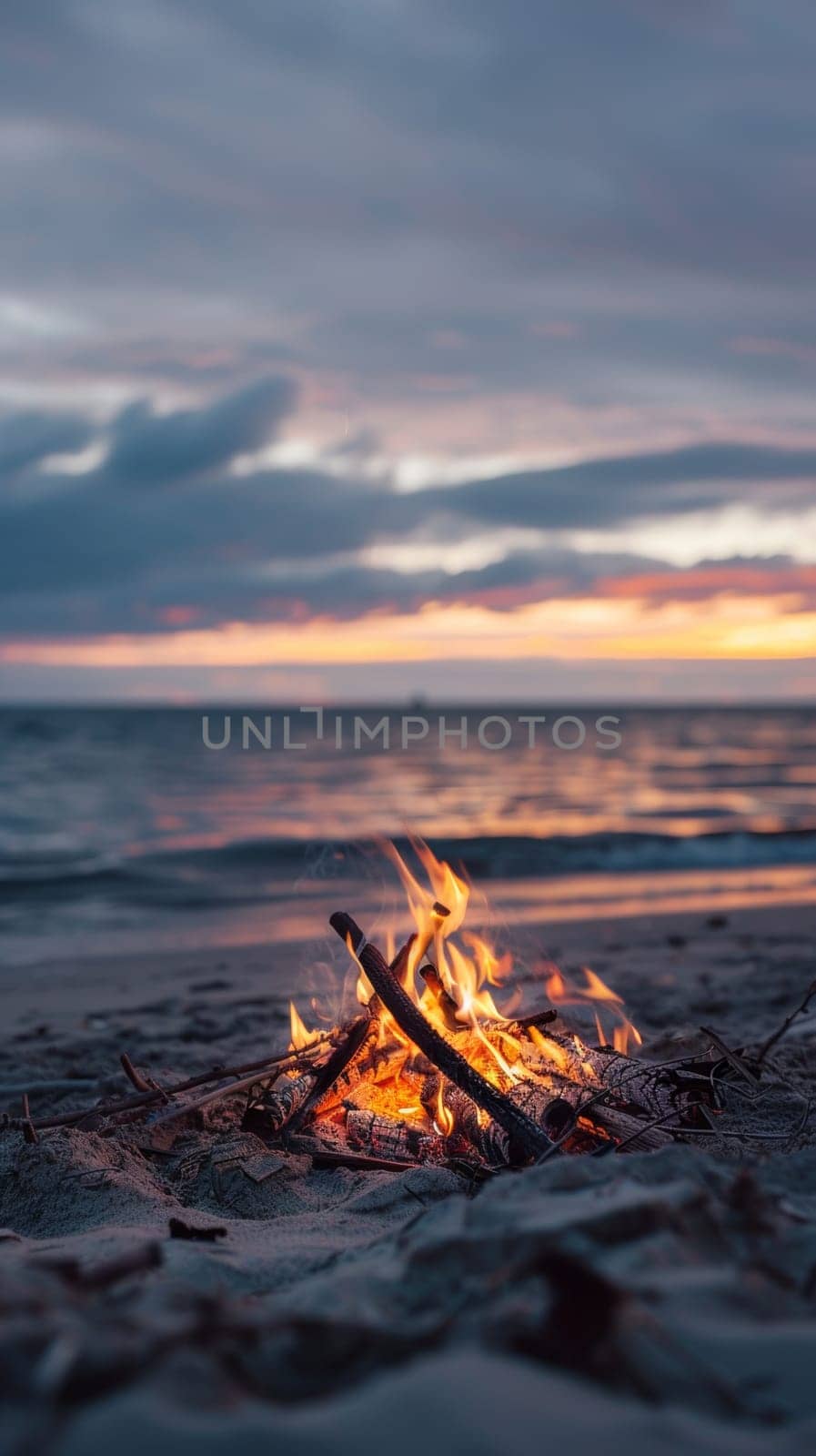 Beach bonfire at sunset