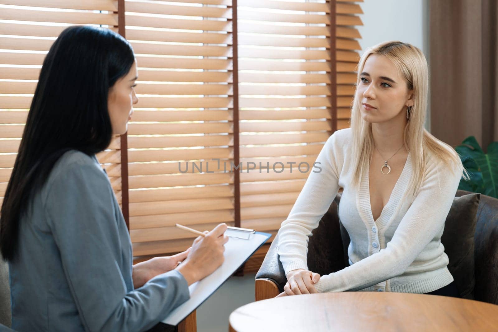 Psychological consultation on mental health or seeking help from professional, young patient on therapy session while psychiatrist making diagnostic on mental illness. Mental treatment session. Blithe