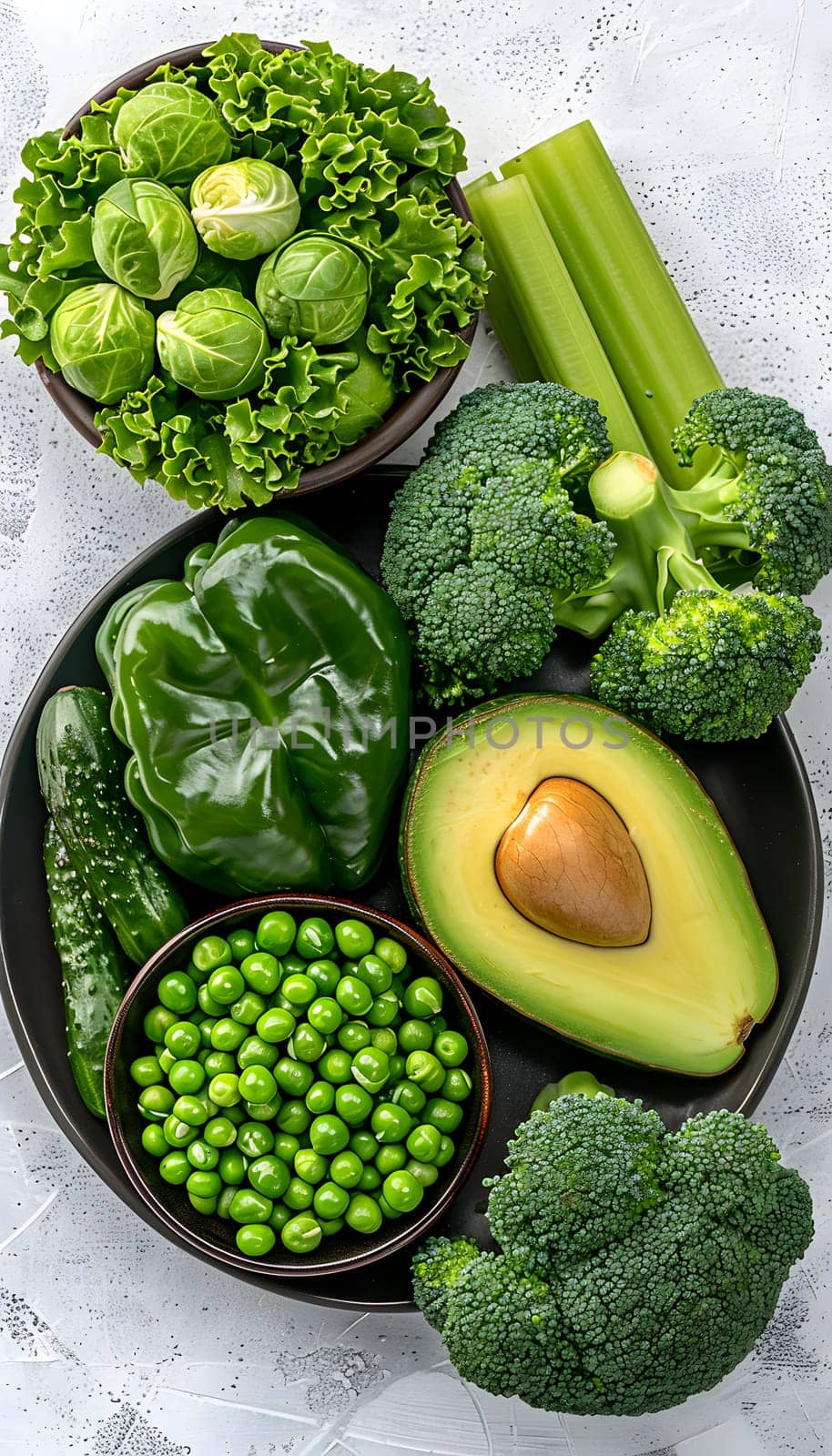 A variety of green vegetables, such as broccoli and leafy greens, are showcased on a plate. These natural foods can be ingredients in many delicious cuisine recipes