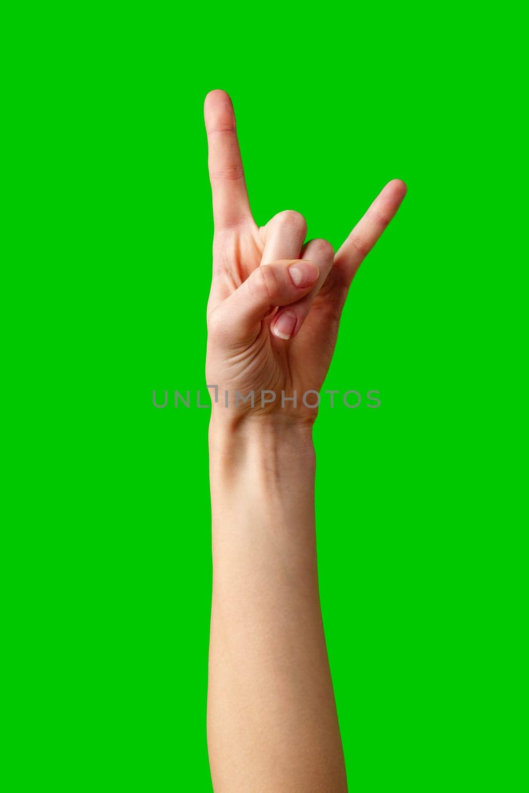 A person extending their hand with two fingers raised in a V-shaped peace sign gesture.