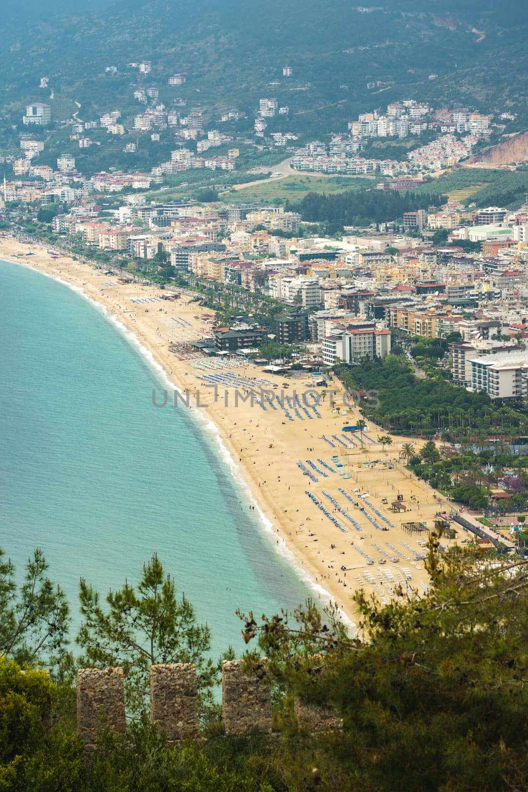 View of Cleopatra beach in Alanya, one of the touristic districts of Antalya, from Alanya Castle by Sonat