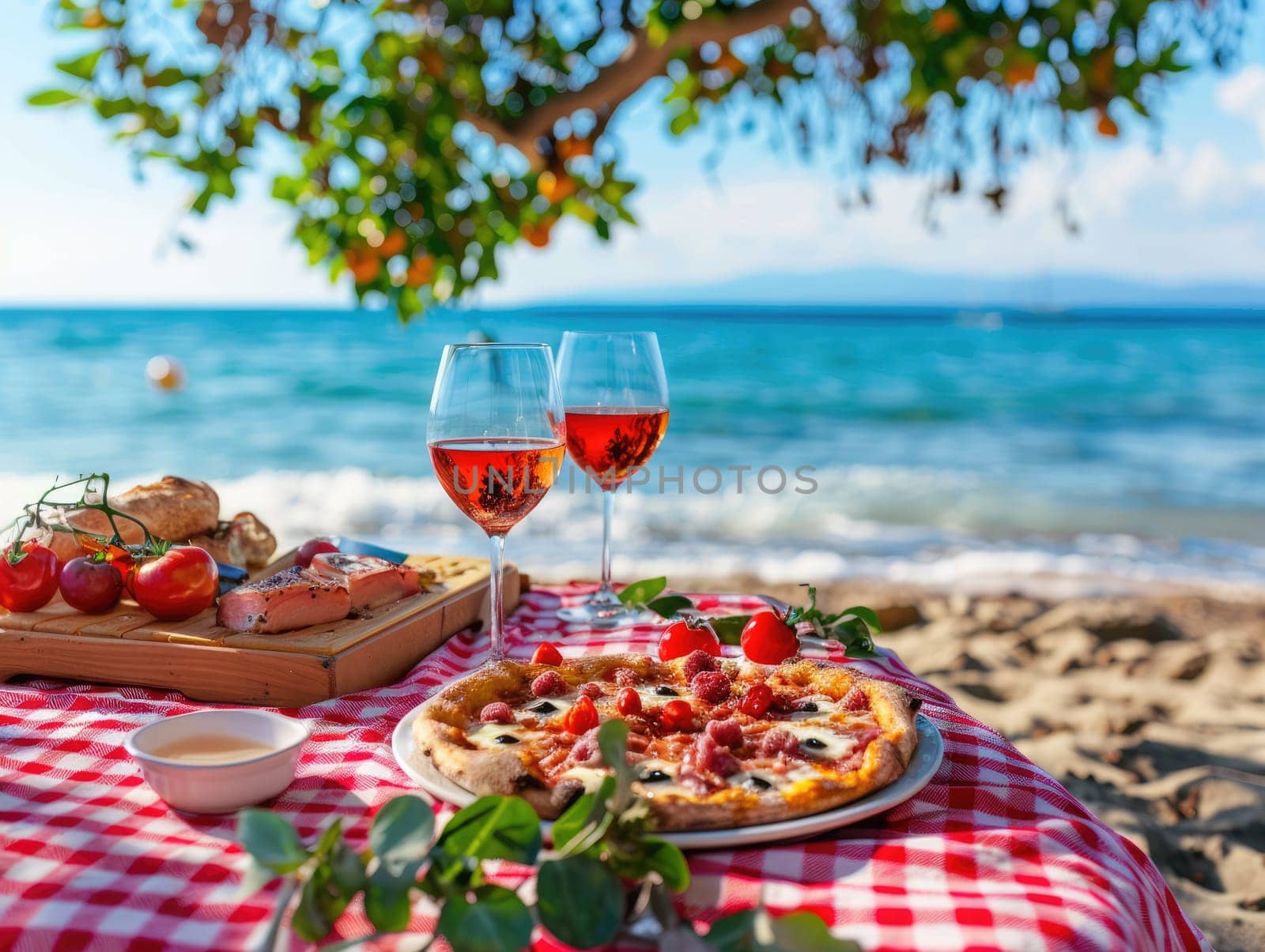 Seaside picnic with red wine in glasses, pepperoni pizza, and fresh grapes on checkered blanket. Romantic outdoor dining concept with a sea view and natural setting. Ai generation by Lunnica