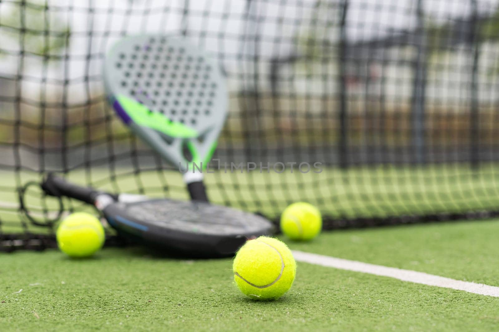 paddle rackets on the playing court. High quality photo