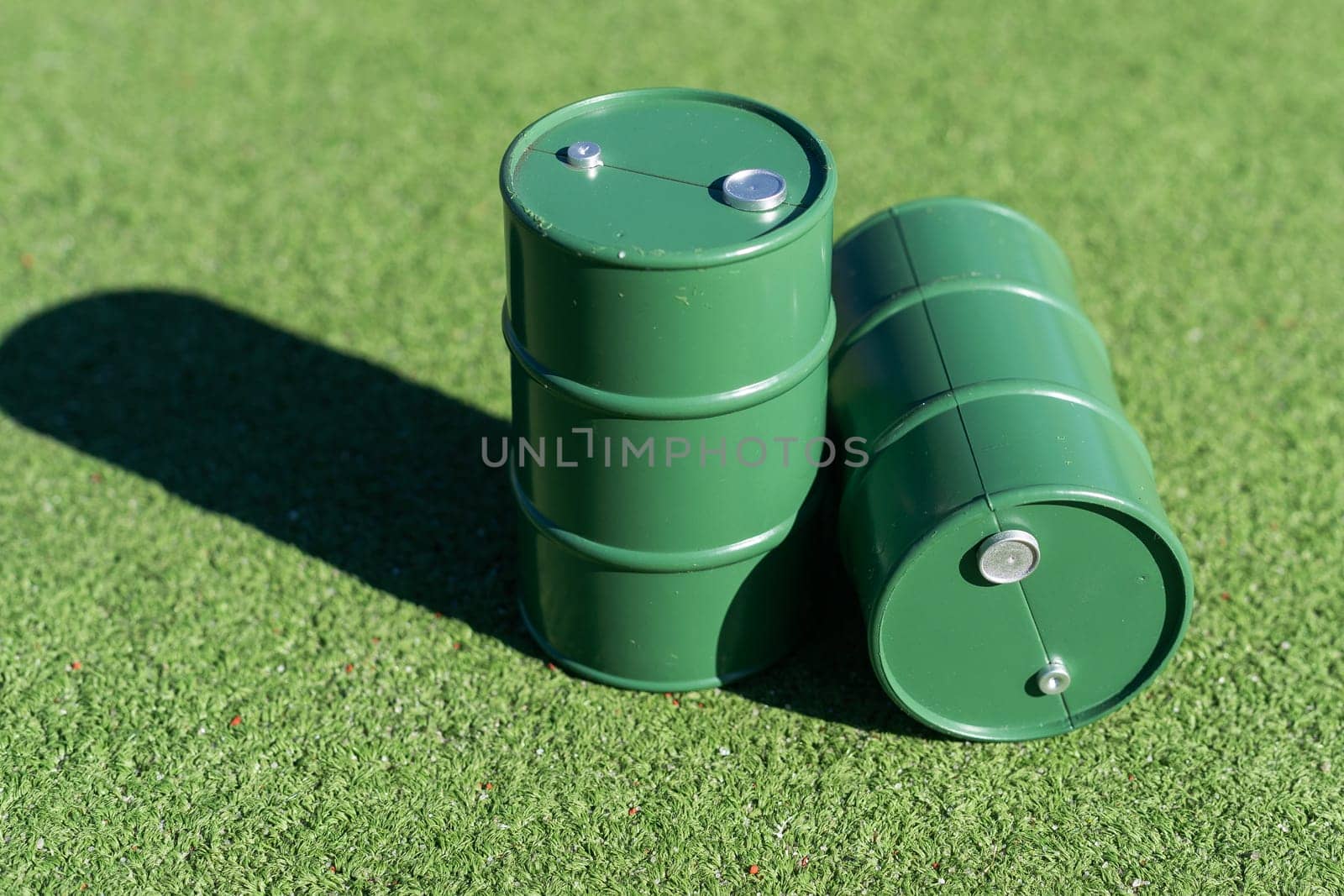 oil barrels on green background. High quality photo