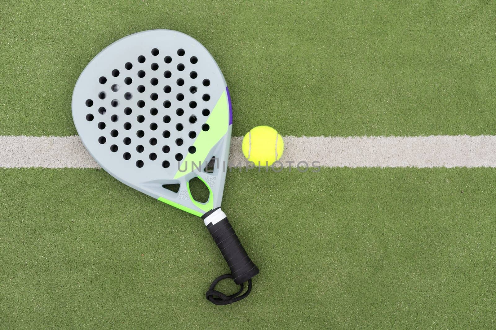 paddle rackets on the playing court. High quality photo