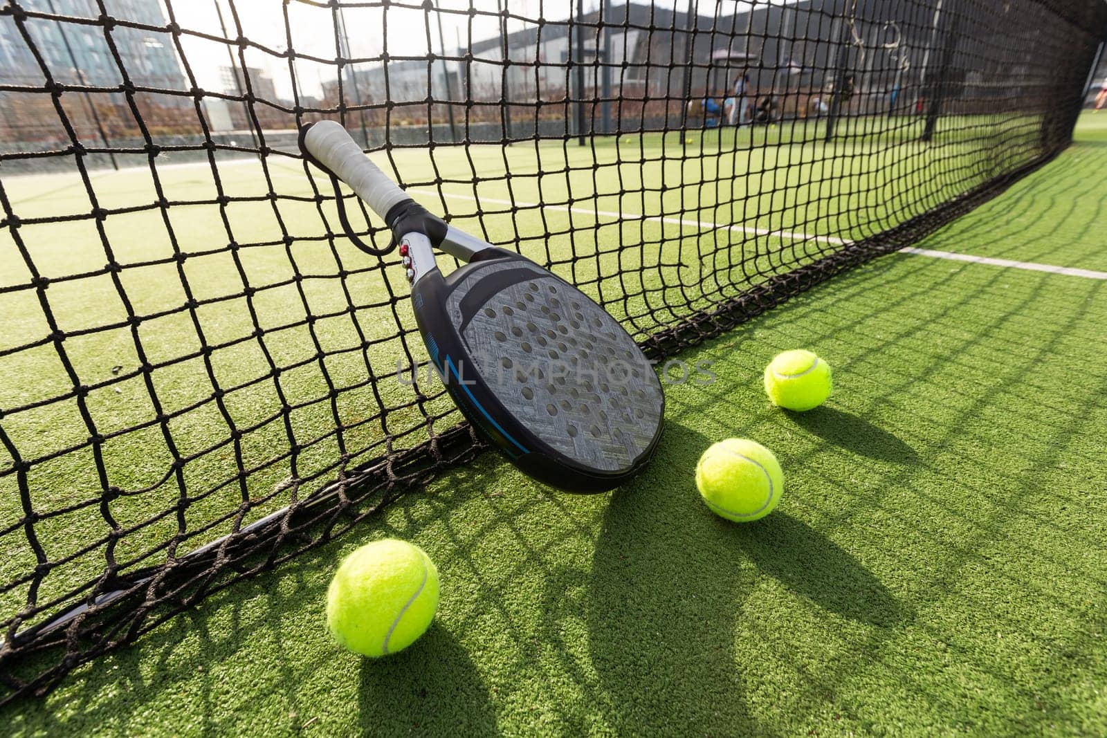 Paddle tennis racket and ball. High quality photo