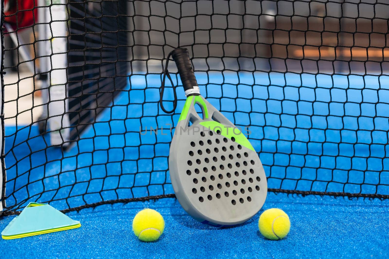 Paddle tennis racket and ball. High quality photo