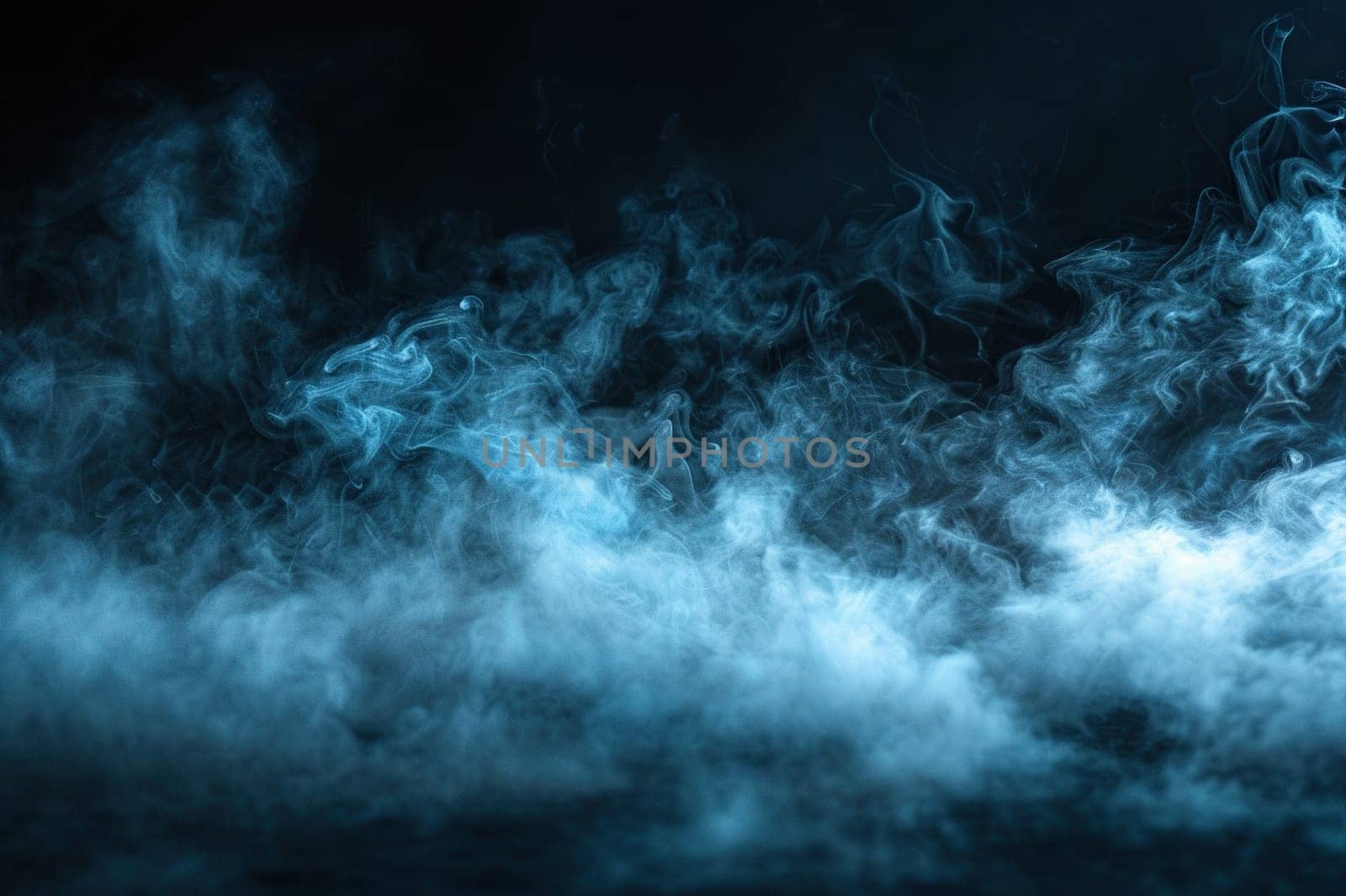Abstract blue smoke on a black background.