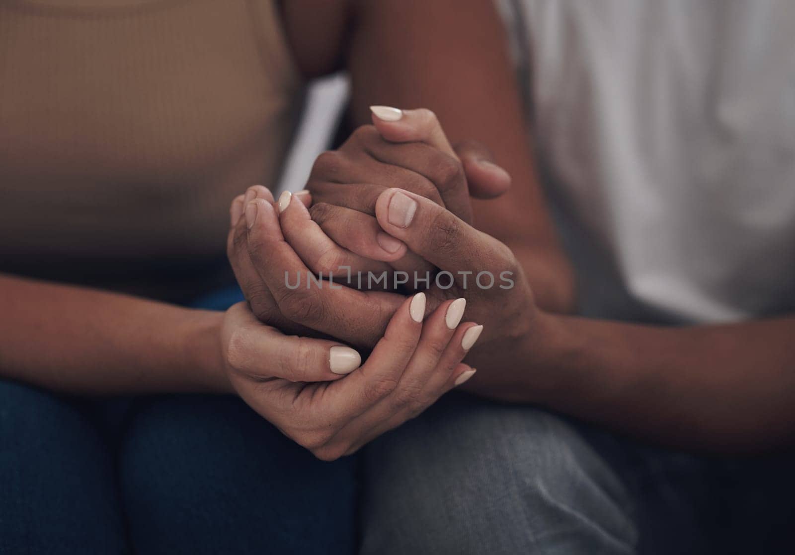 Couple, love and holding hands for trust, care and solidarity or romance with studio background. Compassion, partnership and relationship for people, hope and support for affection and intimacy.