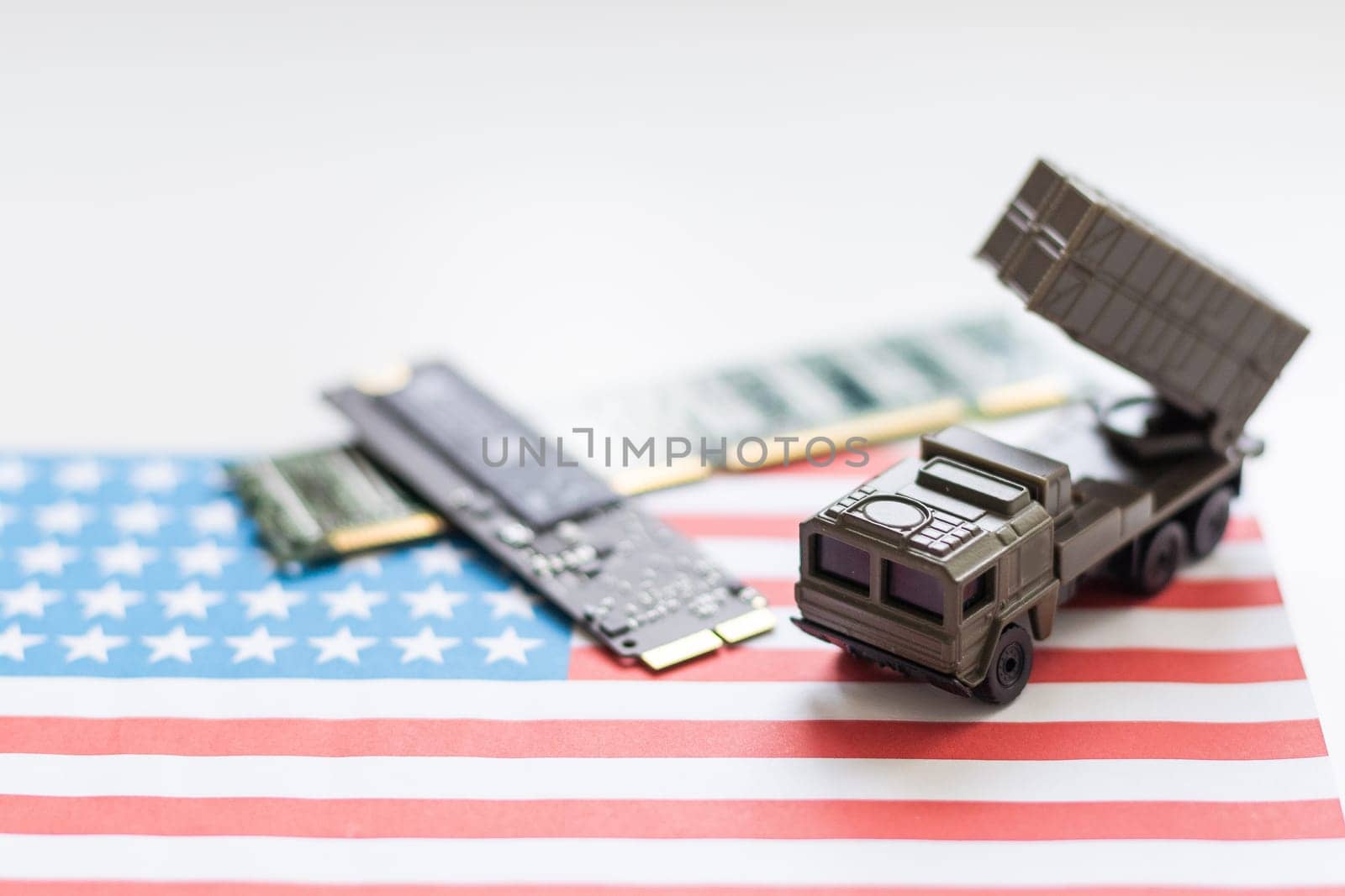 A toy military vehicle with a rocket and microcircuit. High quality photo