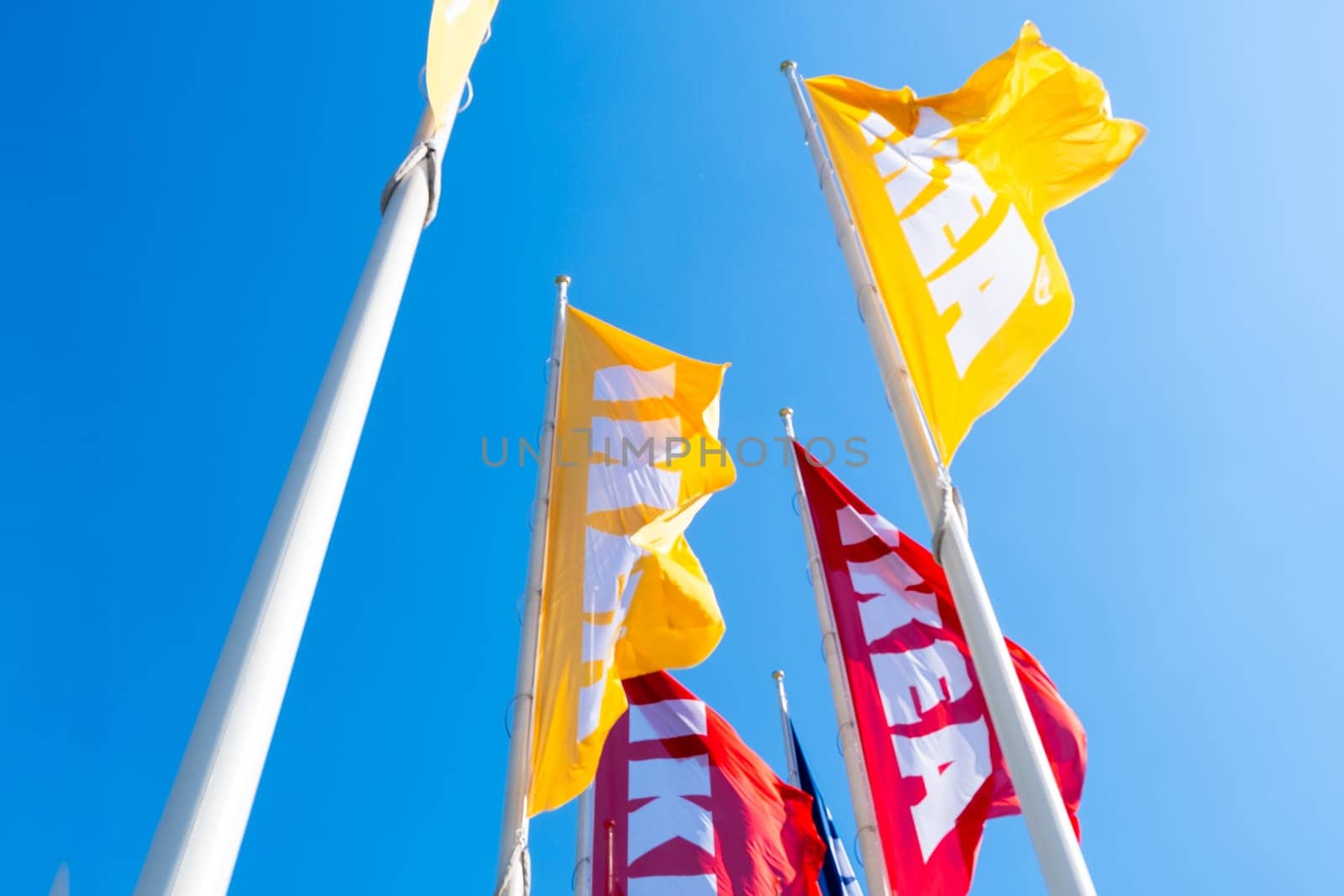 PRAGUE, CZECHIA -APRIL, 2024: Yellow and Red flags of IKEA mass market.