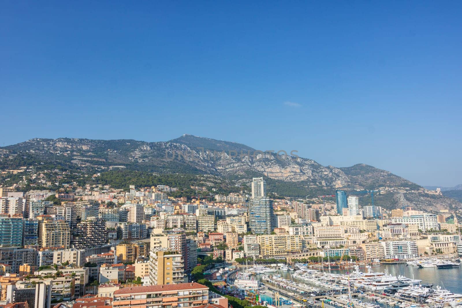 Panoramic view of Monte Carlo marina and cityscape. Principality of Monaco, French Riviera