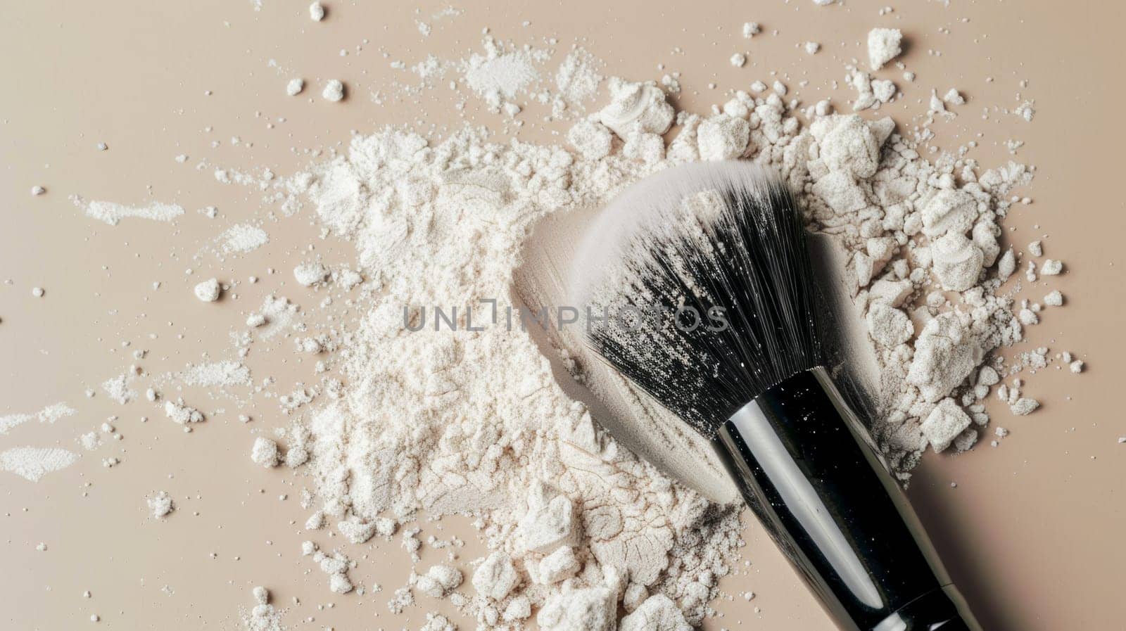 Close up of a makeup brush and powder explosion on a beige background by Anastasiia