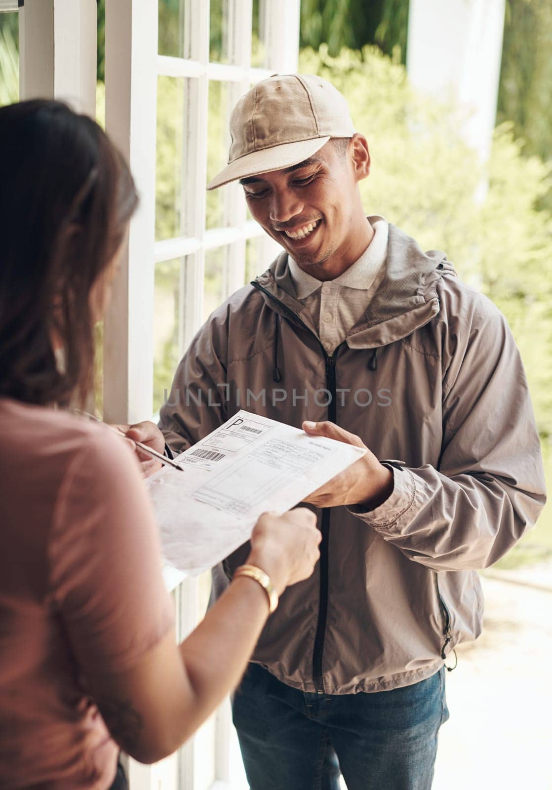 Delivery, signature and courier man with customer at front door of home with paperwork for safety. Invoice, document and sign paper for receipt of mail, shipping of package and distribution service.