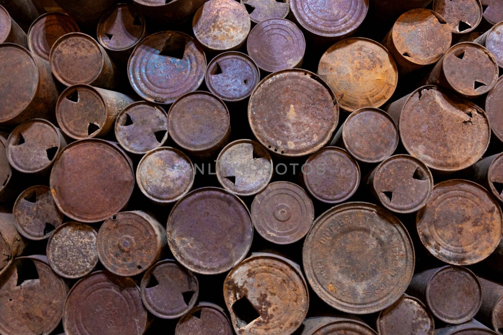 Old rusty and rusted tin cans background by bRollGO