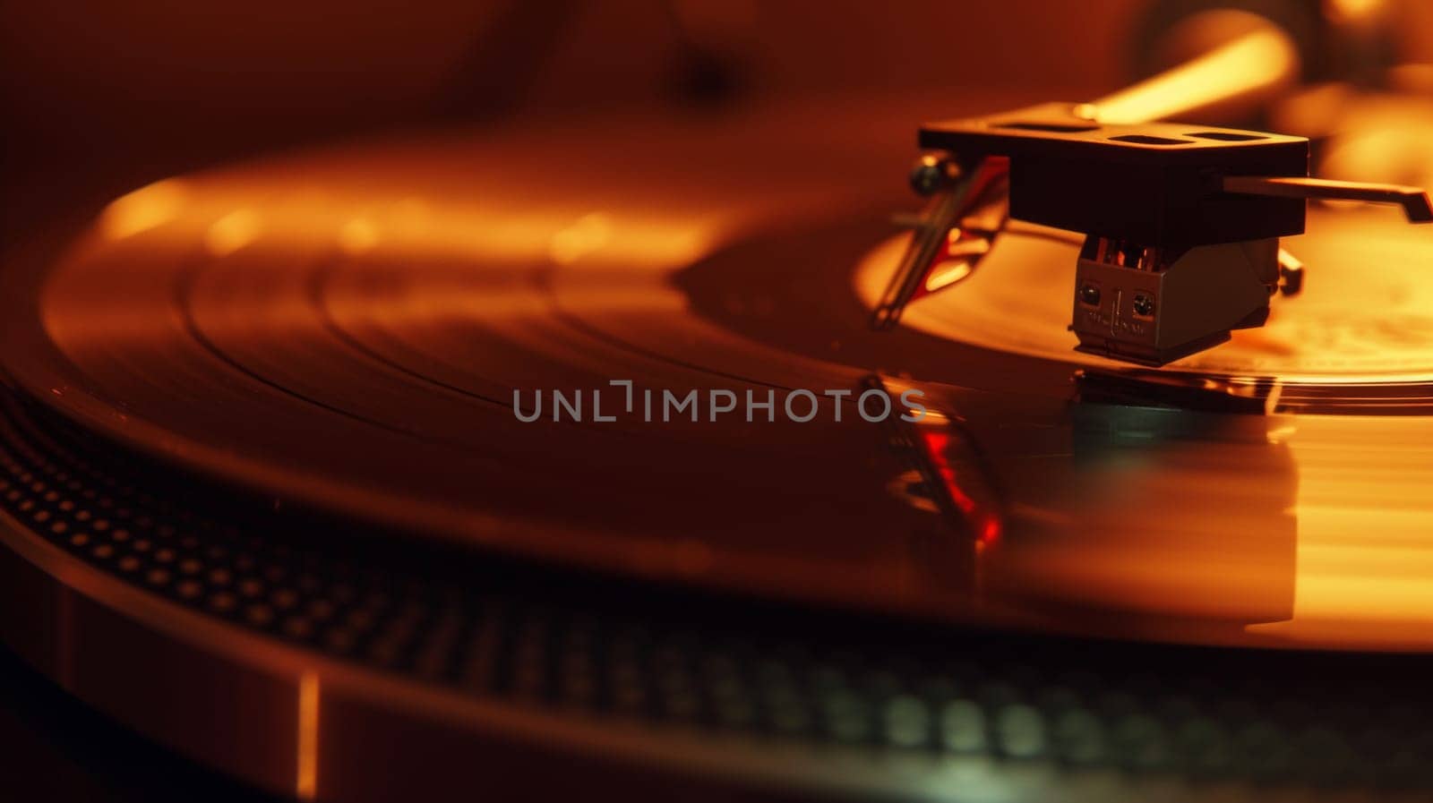 Close-up of a vinyl record player, evoking a nostalgic and warm atmosphere