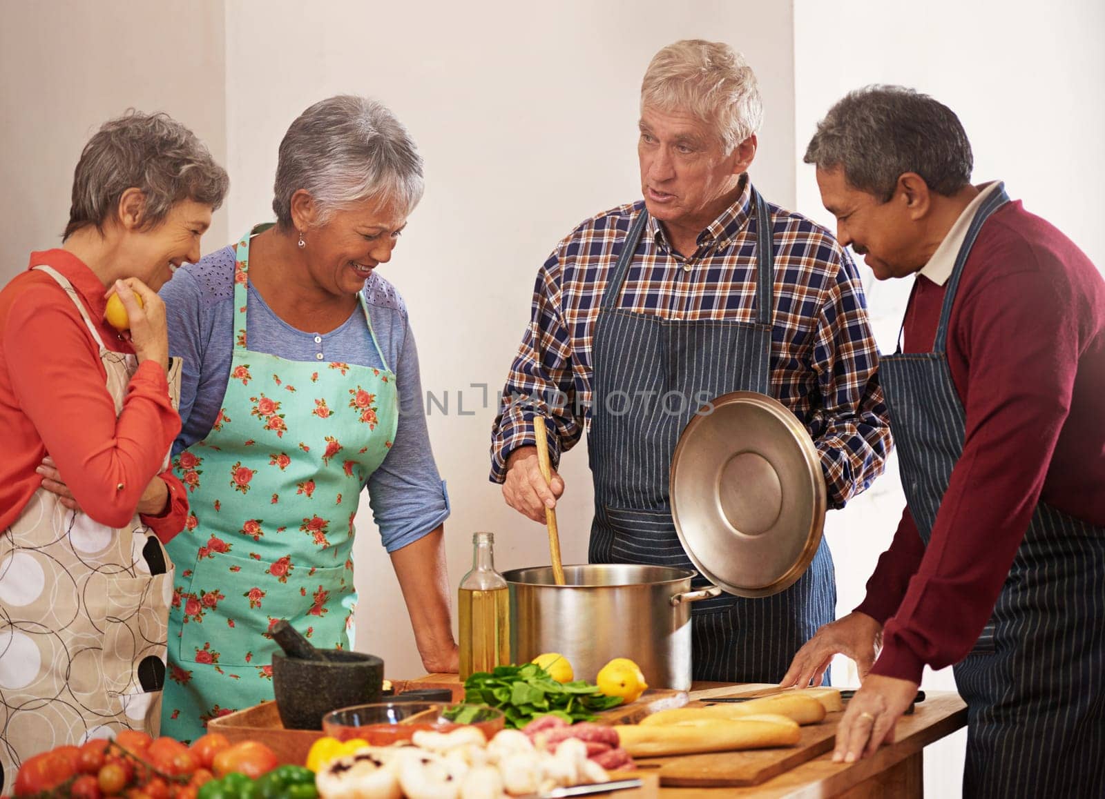 Cooking class, chef or senior friends in kitchen for fun, bonding or meal prep for reunion, birthday or weekend dish in house. Diet, nutrition or old people learning traditional food, pasta or recipe by YuriArcurs