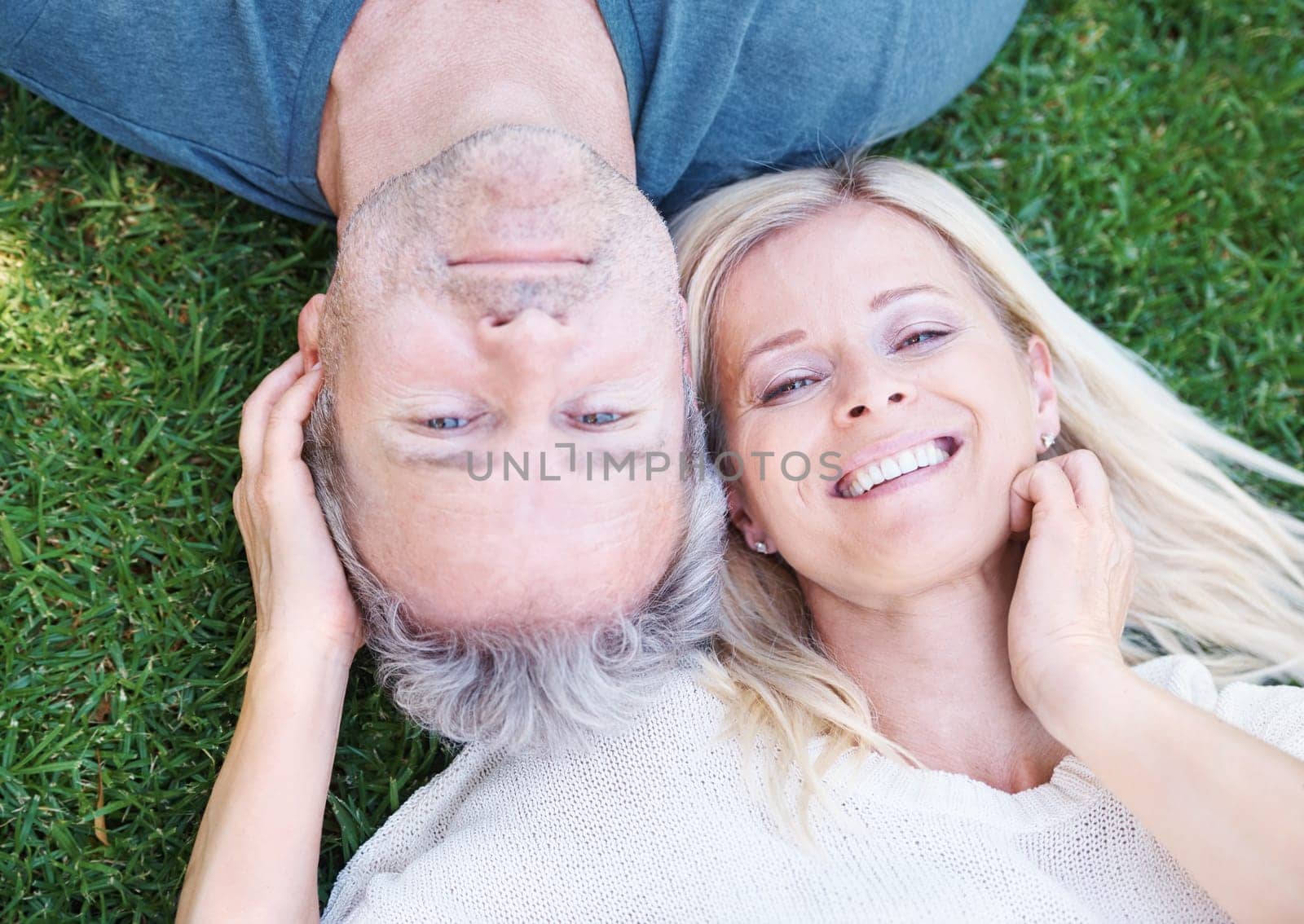 Mature, couple and portrait in grass park as top view for vacation travel in summer, anniversary or marriage. Man, woman and face from above on field in New Zealand or home backyard, love or date.