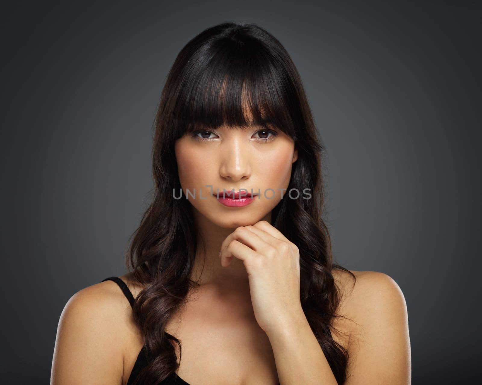 Thinking, woman and makeup for portrait in studio with beauty for natural glow or shine with healthy skin. Confident, female person and cosmetics with skincare treatment for facial wellness by spa.
