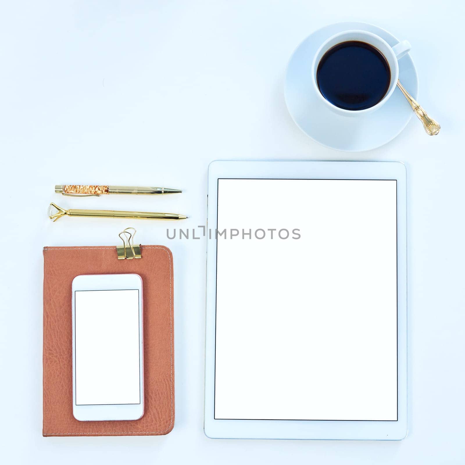 Tablet, smartphone and screen with coffee or above, creative workspace and mockup for online content creation. Blog, pen and technology aesthetic for social media, website and internet display.