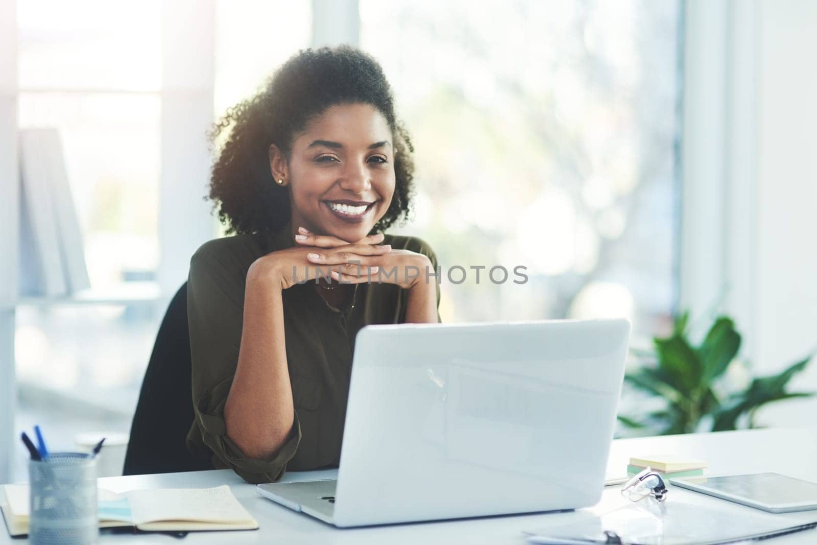 Business, portrait and happy woman with laptop in office for research, planning or case study at law firm. Legal, help and friendly lawyer with paperwork for idea, notes or compliance documents by YuriArcurs