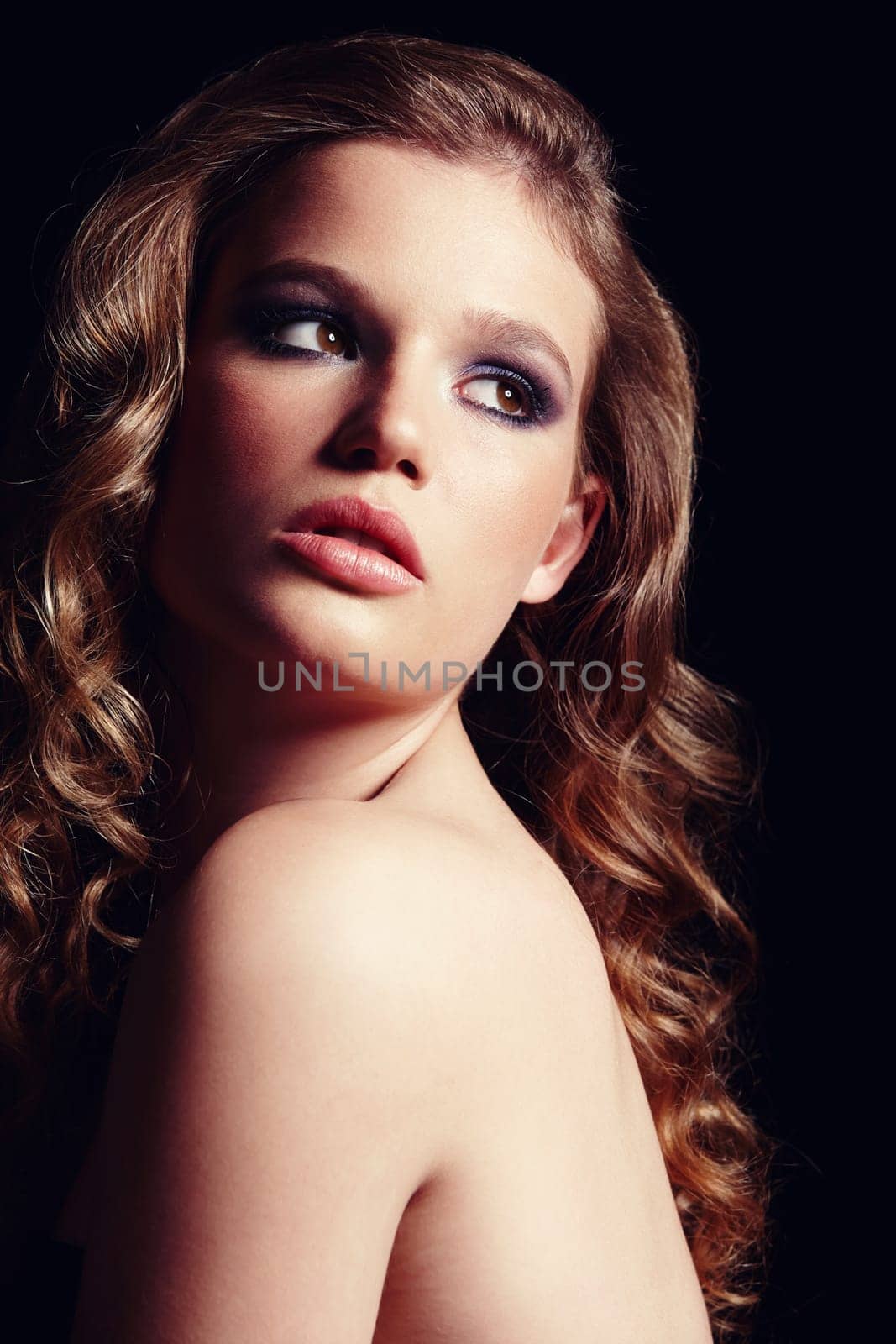 Portrait, woman and makeup for cosmetics in studio with eyeshadow, satisfaction and natural beauty. Confident, elegant and glow, skincare and self love for healthy skin isolated on black background.