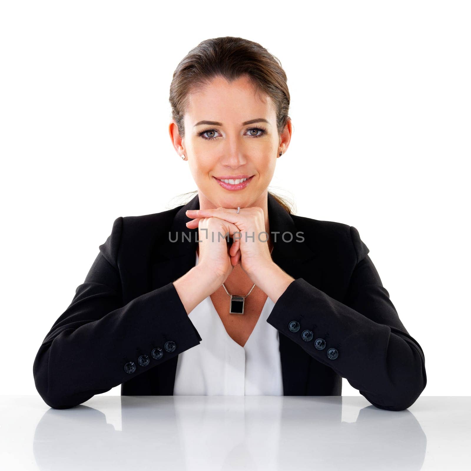 Portrait, happy and confident business woman at table in studio isolated on a white background. Face, smile and professional entrepreneur at desk for career, job and work of advisor in California by YuriArcurs
