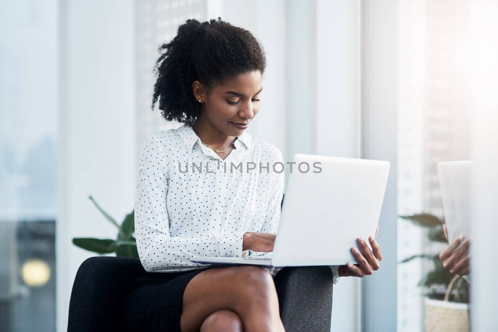 Typing, business and woman with laptop in office for reading emails, project management and daily corporate news or growth. Entrepreneur, digital technology and research, online and review feedback. by YuriArcurs