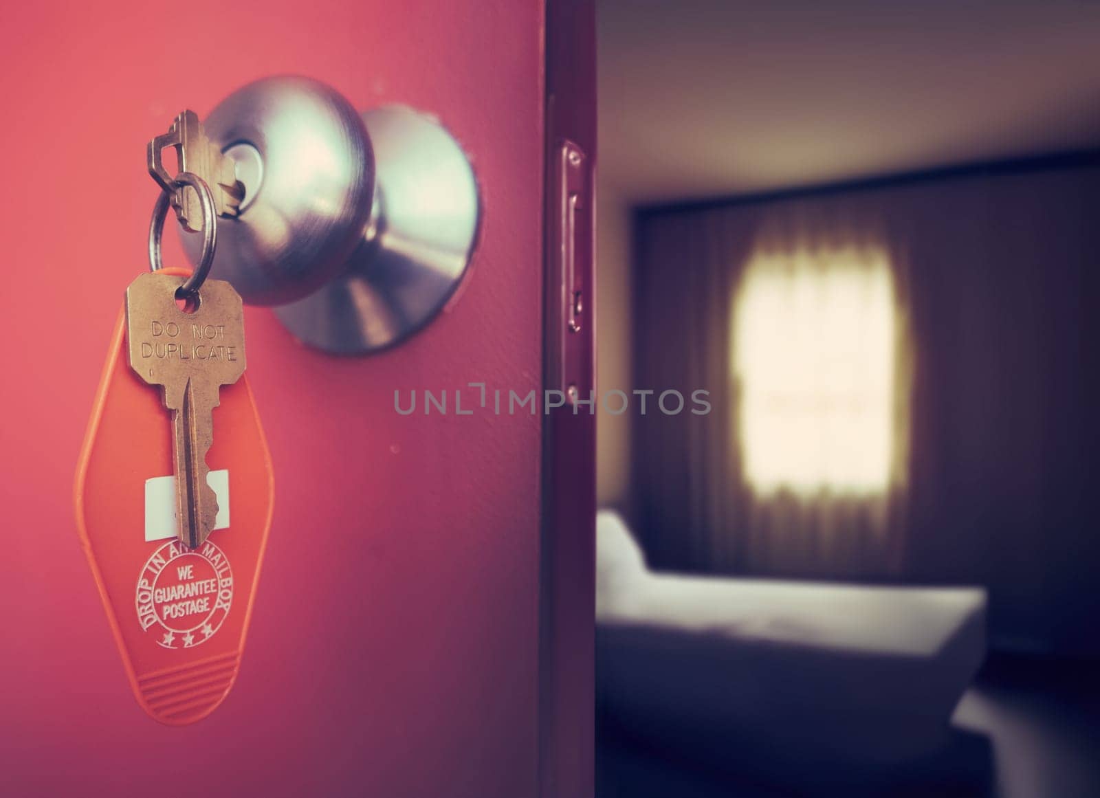 A Retro 70s Era USA Motel Room With Focus On The Key In The Door
