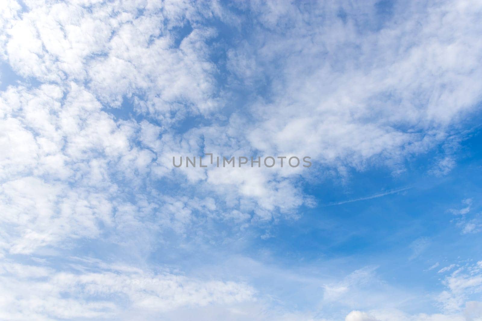 Blue Sky background with white Clouds. Panorama background.