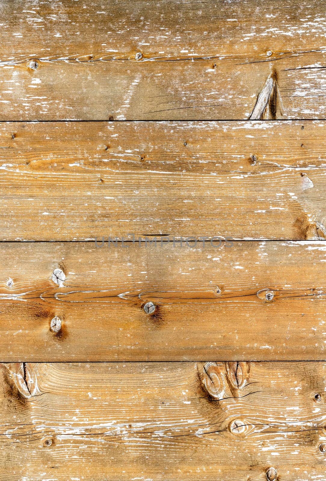 Brown wood texture background coming from natural tree. The wooden panel has a beautiful dark pattern, hardwood floor texture.