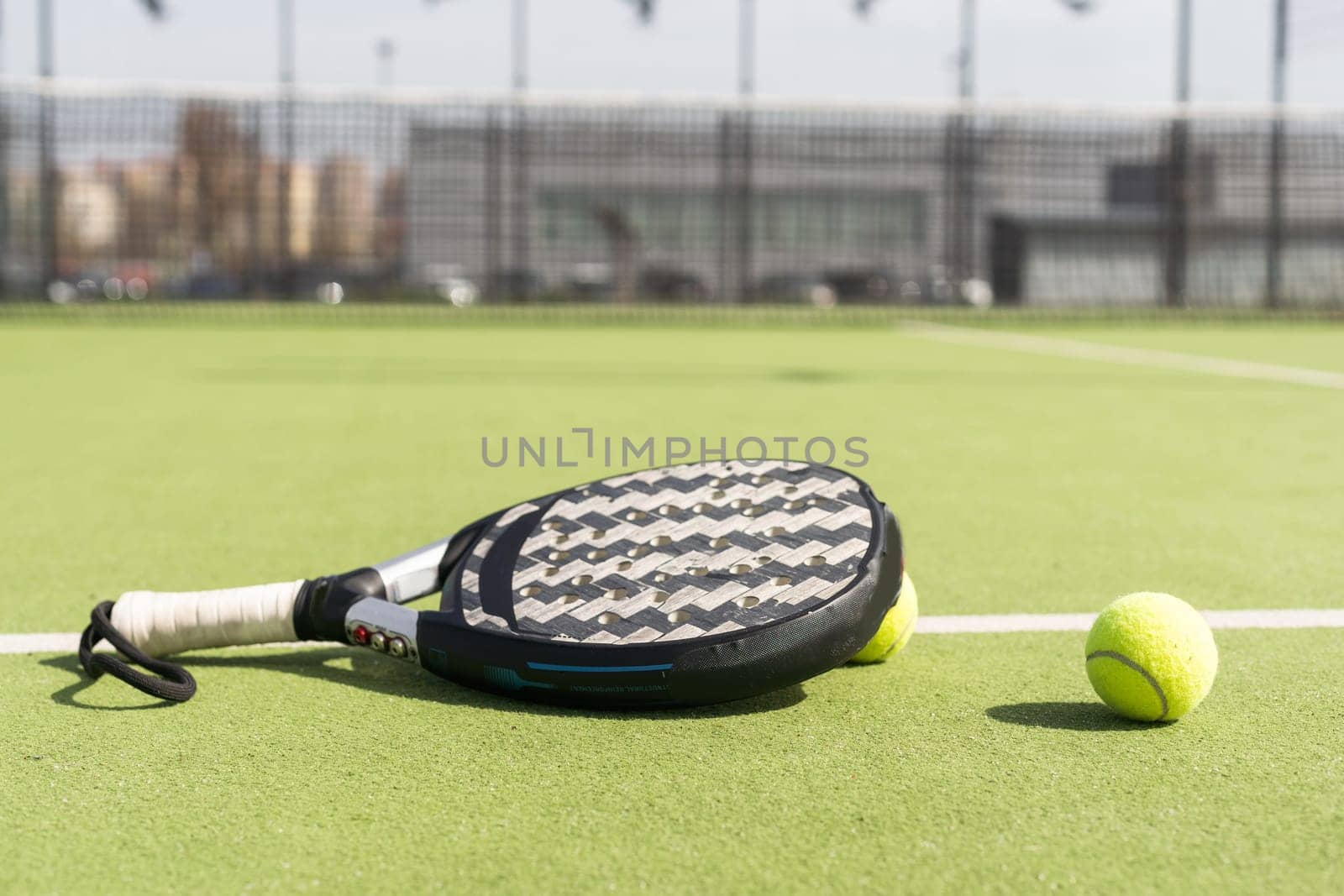 Paddle tennis racket and ball. High quality photo