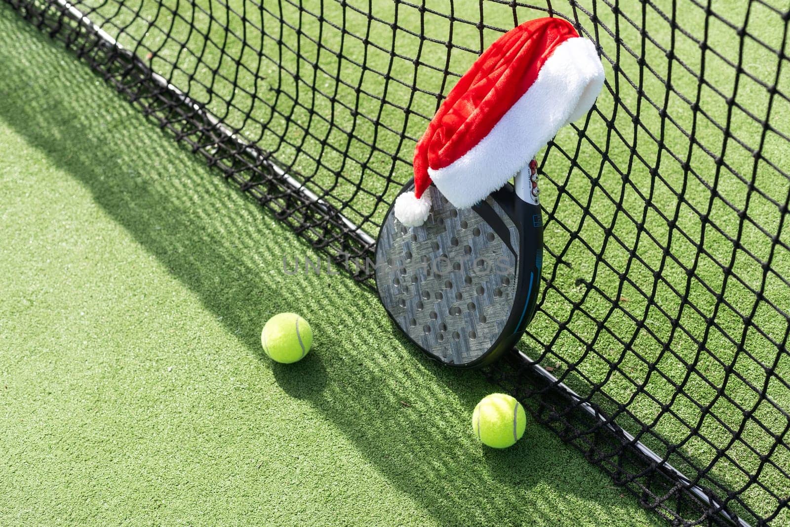 padel racket and santa hat. High quality