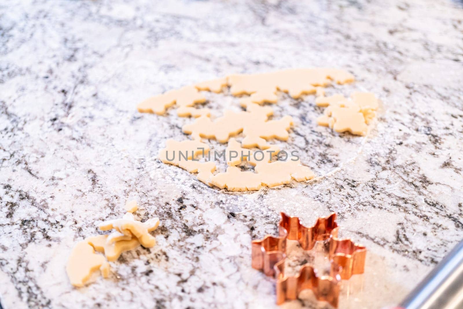 Baking Snowflake-Shaped Sugar Cookies for Homemade Christmas Gifts by arinahabich
