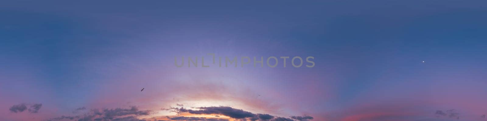 Dramatic Sunset sky 360 panorama. Vibrant sky with bright glowing red pink Cumulus clouds. HDR 360 seamless spherical panorama. Sky dome for aerial drone panoramas. Climate and weather change