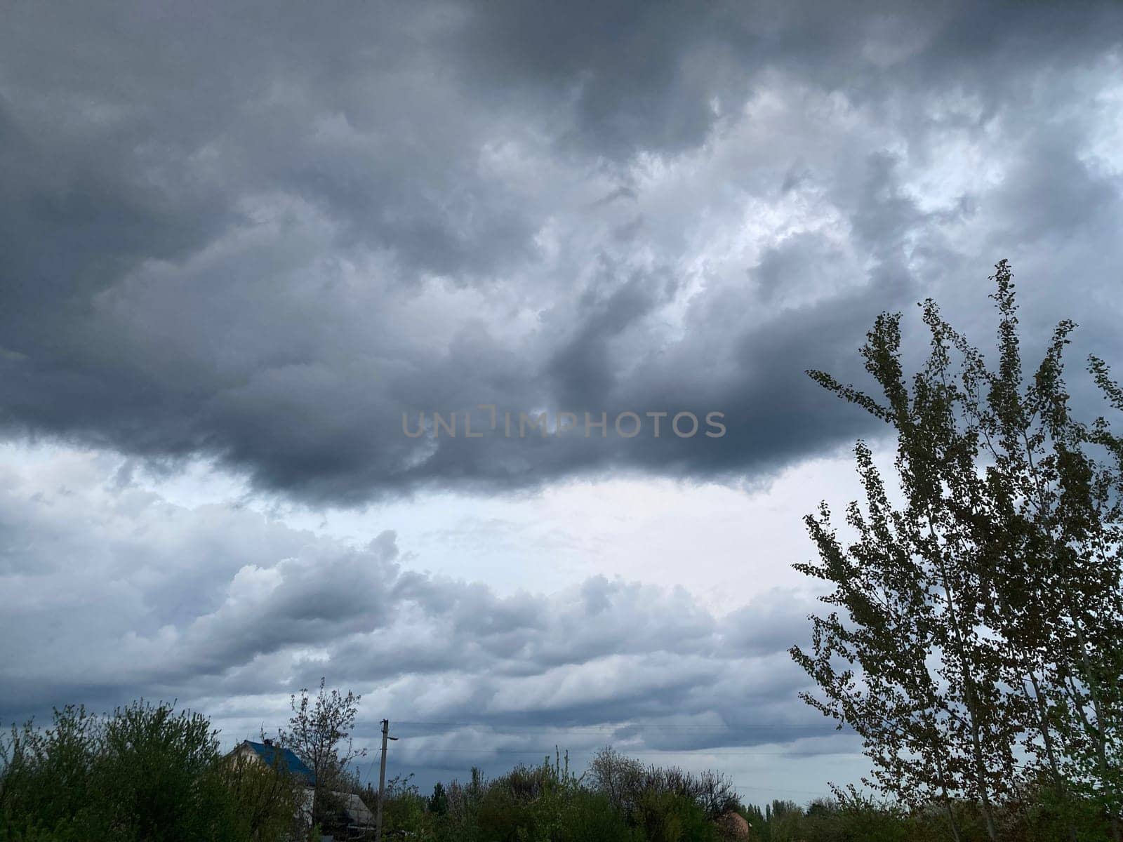 Thunderclouds before rain in a the village