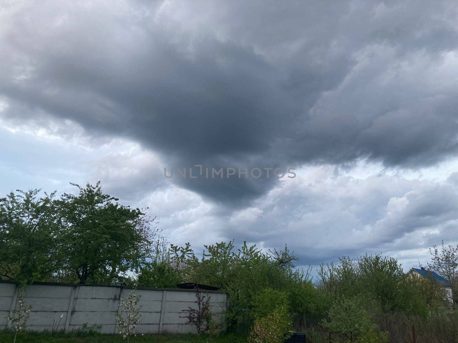Thunderclouds before rain in a the village