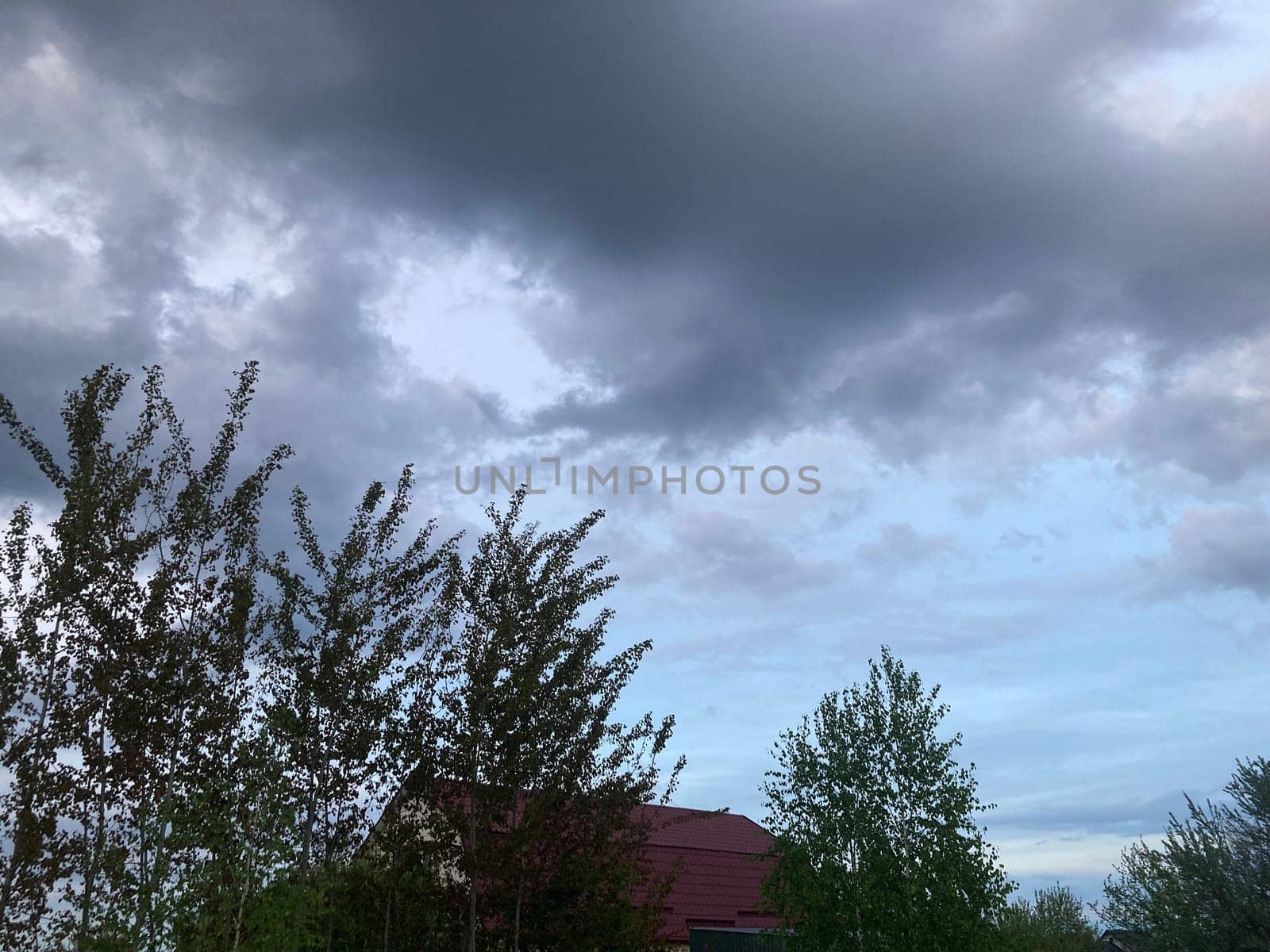 Thunderclouds before rain in a the village