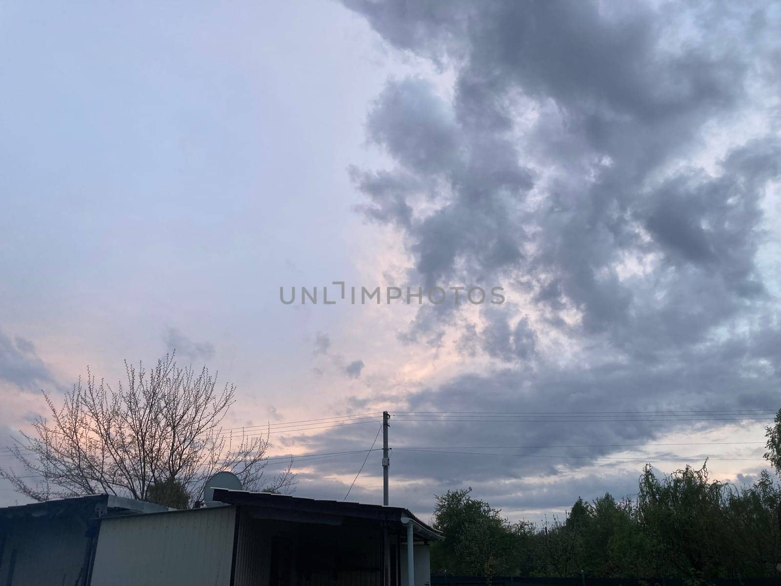Thunderclouds before rain in a the village