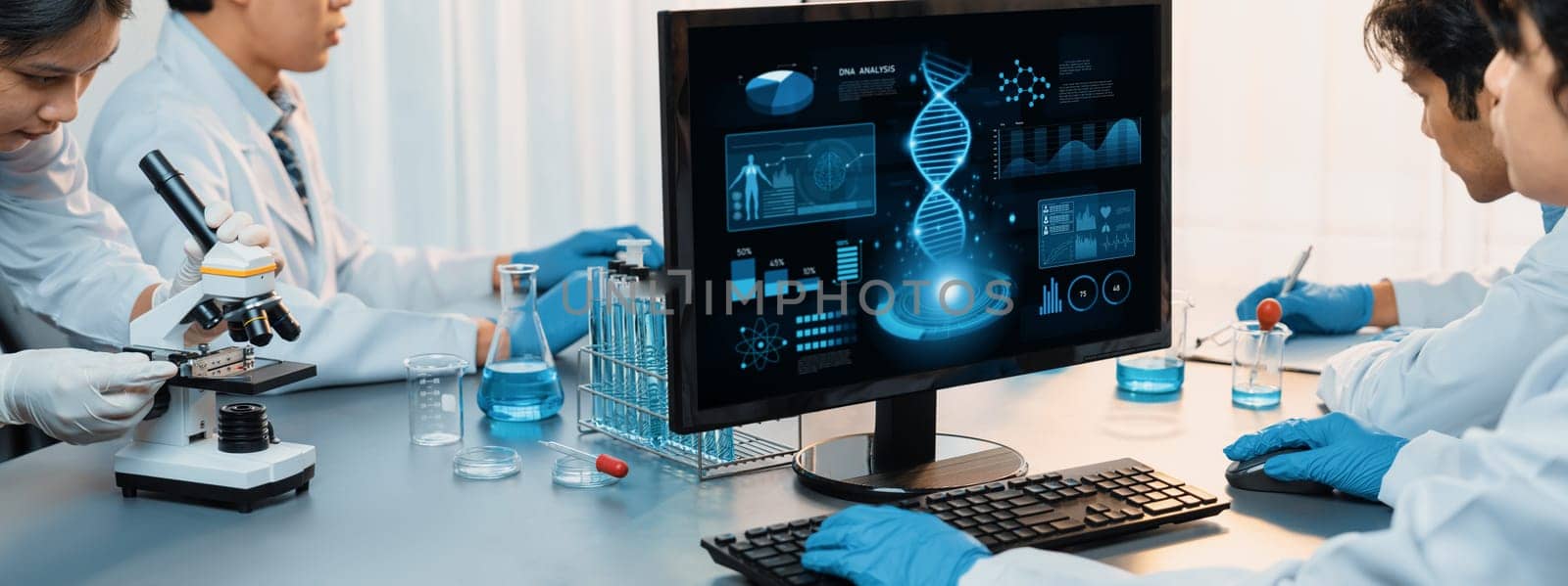 Scientist working on biotechnology computer software to study DNA. Neoteric by biancoblue