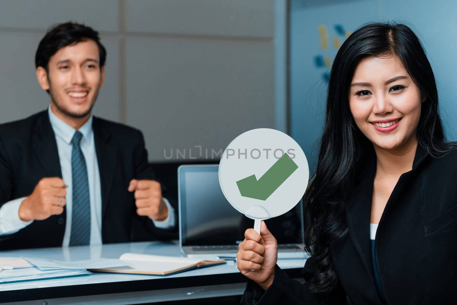 Human resource manager hire male employment candidate who pass interviewing, sitting in office room. Happy OK job interview. Job application, recruitment and Asian labor hiring concept. uds