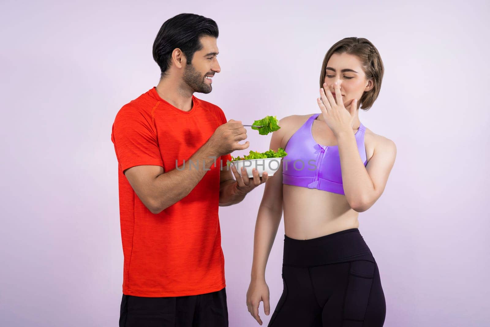 Full body length gaiety shot athletic and sporty young couple with healthy vegan by biancoblue