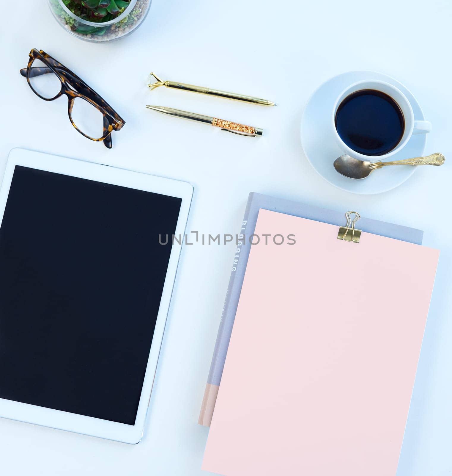 Above of notebook, tablet and coffee in studio for working, writing notes and planning for career. Creative business, mockup space and diary, smartphone or screen for social media on white background.