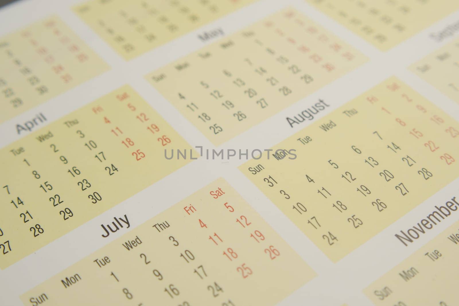 detail shot of a calendar on table, by towfiq007