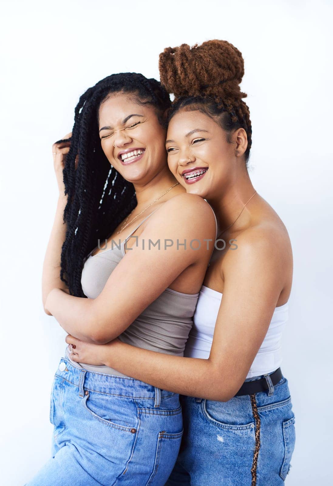 Studio, women and lgbtq with smile in fashion for gay pride, romantic and solidarity on white background. Lesbian, partner and couple with care in love for style, support and happiness together by YuriArcurs