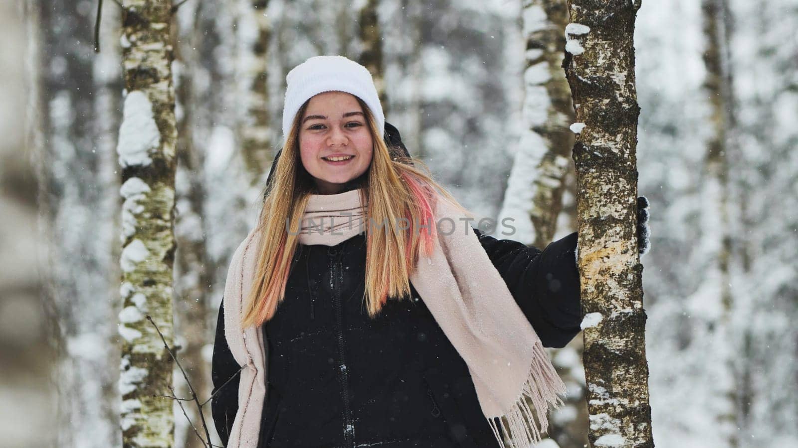 Portrait of a girl in winter in a birch forest. by DovidPro